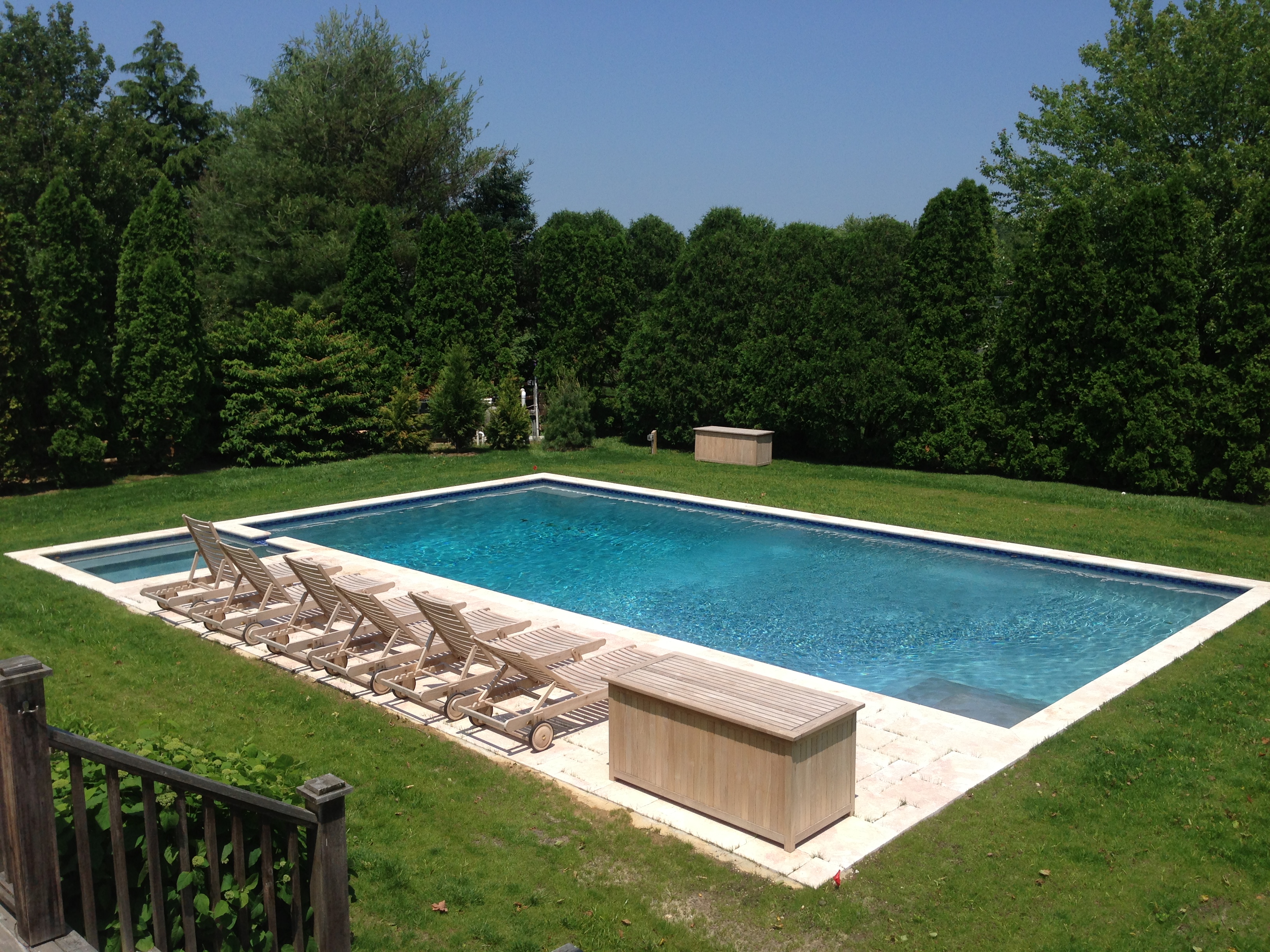 Pool & spillover spa with marble in Suffolk County | Patricks Pools ...